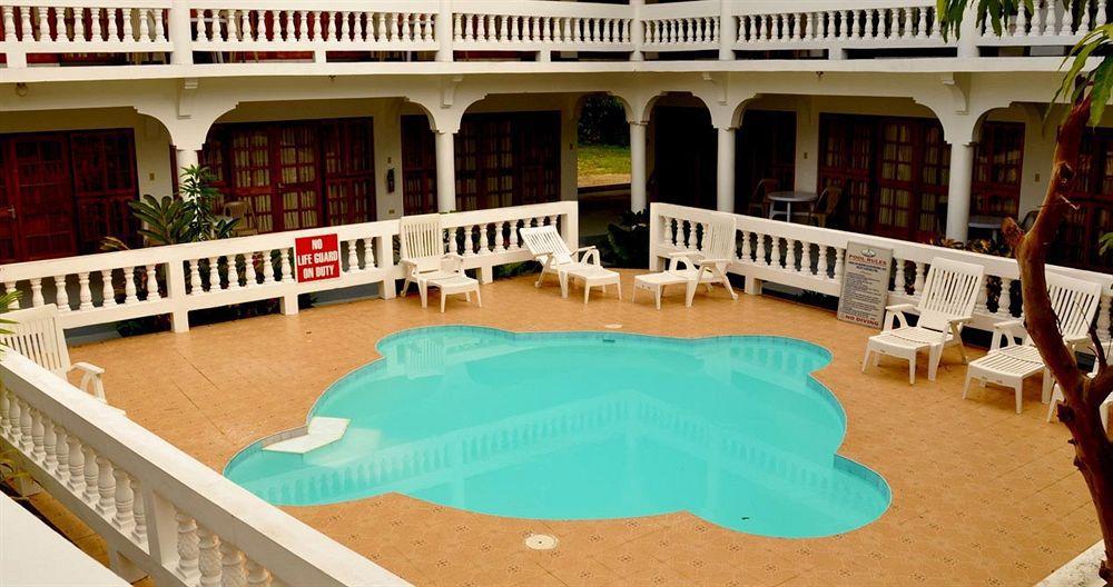 Pure Oasis Resort Негрил Экстерьер фото